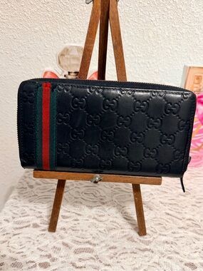 Gucci Black Embossed GG Zip Around Wallet with Green-Red Stripe